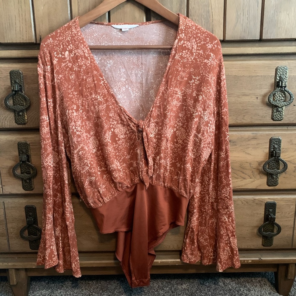 Burnt orange free people body suit
